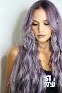 kareya-saleh-tLKOj6cNwe0-unsplash Sey Girl with violett hair startet a onlyfans carreer. Net incom with onlyfans